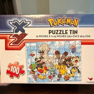 Pokemon Puzzle Tin with Red and Blue Accents